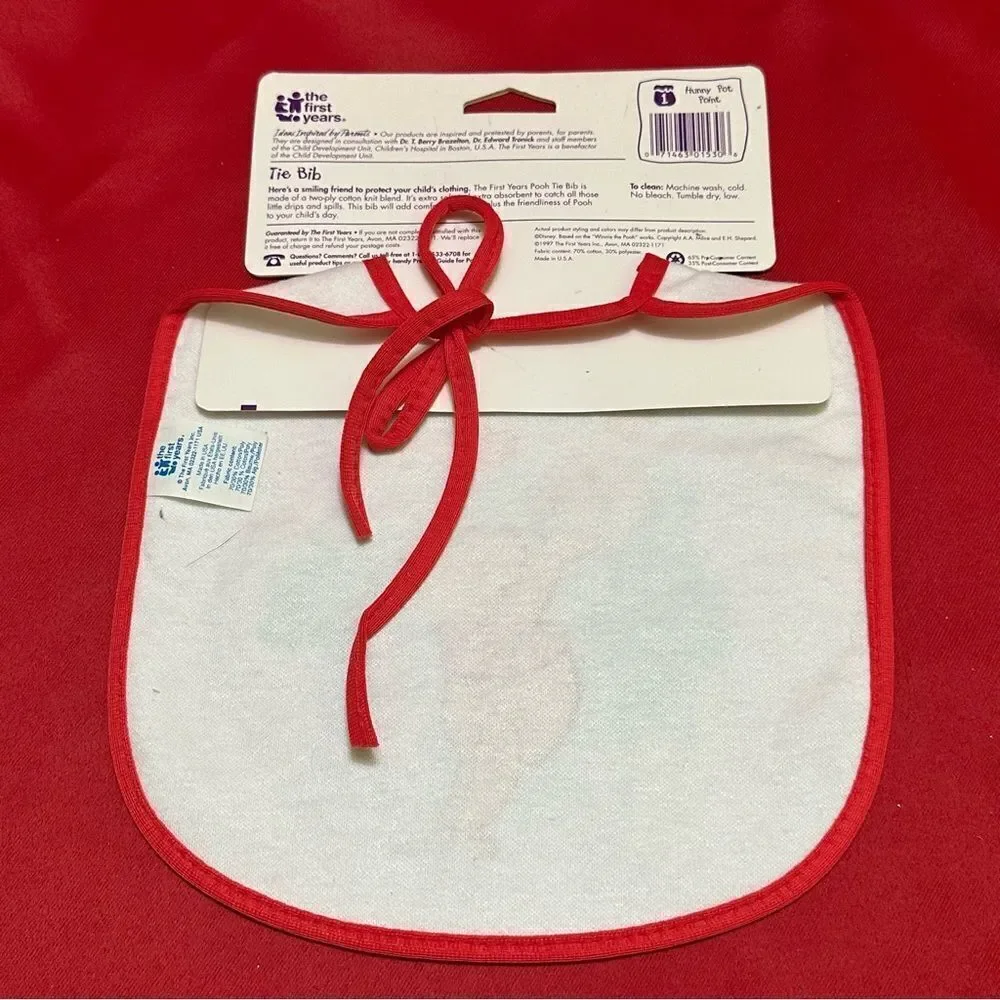 The first years Pooh Tie Bib infant